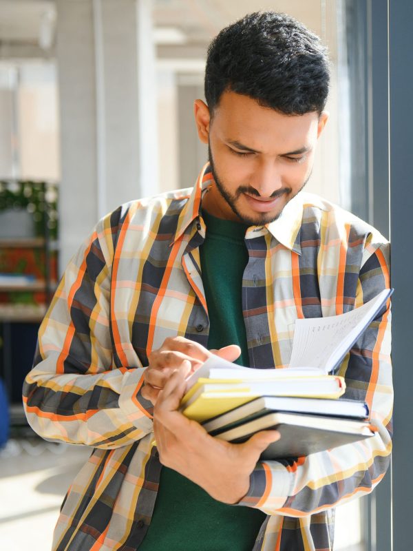 happy-indian-male-student-at-the-university-2025-03-15-06-34-33-utc (1)